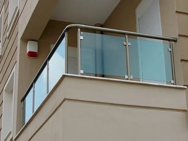 Residential building with stainless steel balcony railing