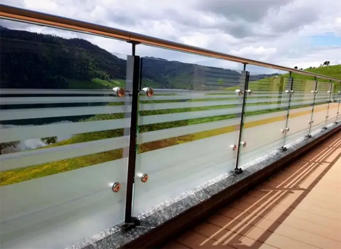 Steel safety railing with glass panels for outdoor balcony