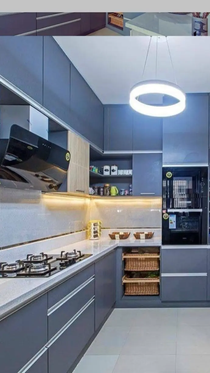Contemporary modular kitchen with storage cabinets and chimney