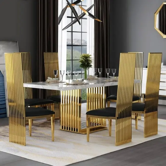 High-end dining set with golden stainless steel chairs and a marble-top table for a premium interior look.